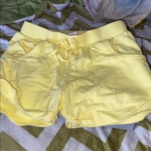 I am selling a pair of yellow shorts 🙏🏻❤️❤️